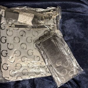 NEW- G logo Crossbody- Matching wallet
Black- Silver Hardware
Stylish &practical
